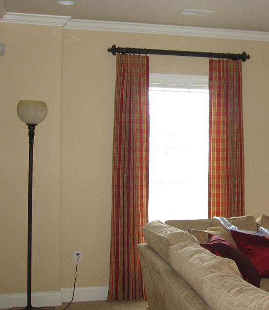 image of drapes on a wood rod with rings