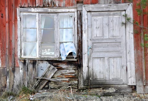 Picture of some really old windows and a door